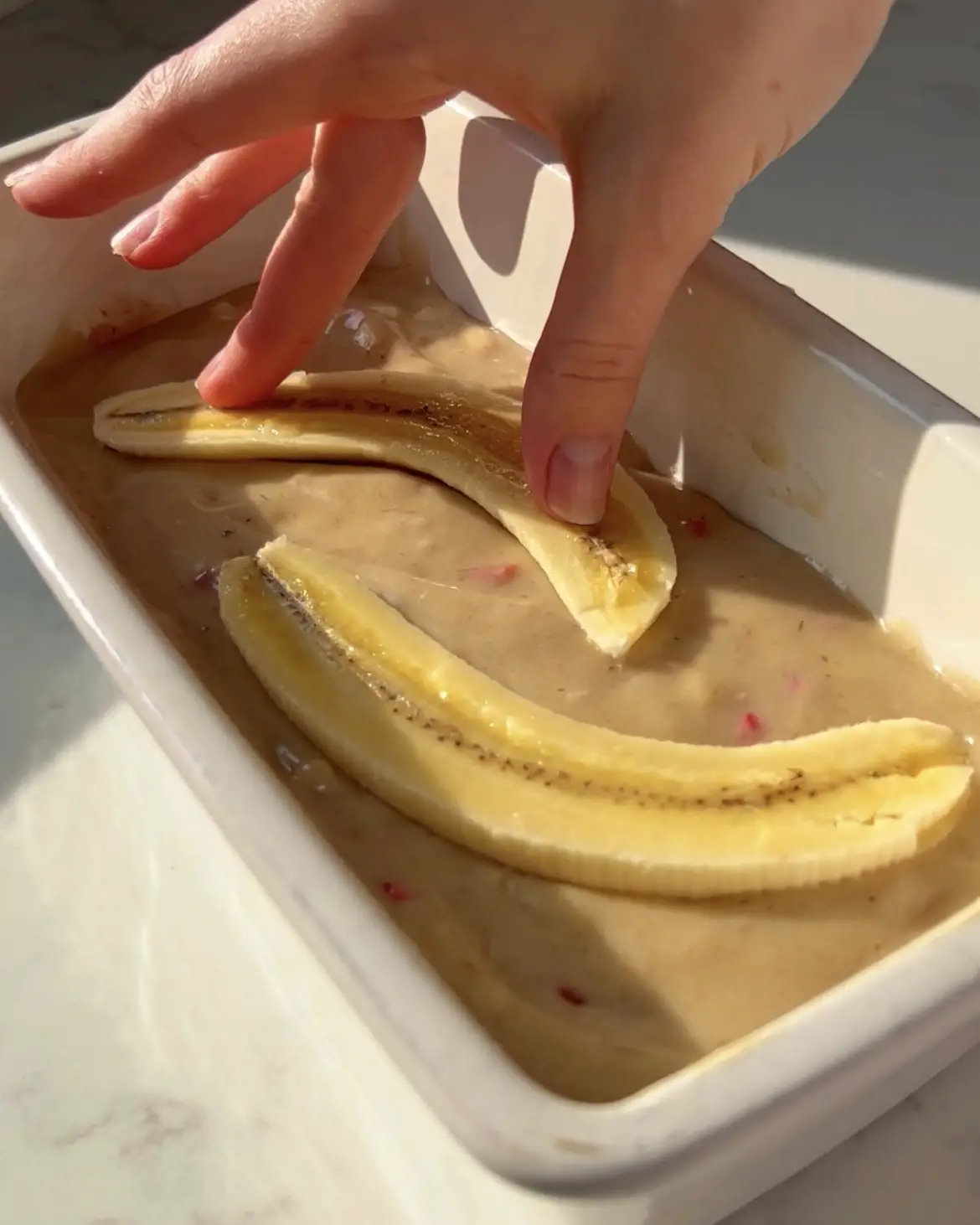 add the banana to the white chocolate and raspberry banana bread