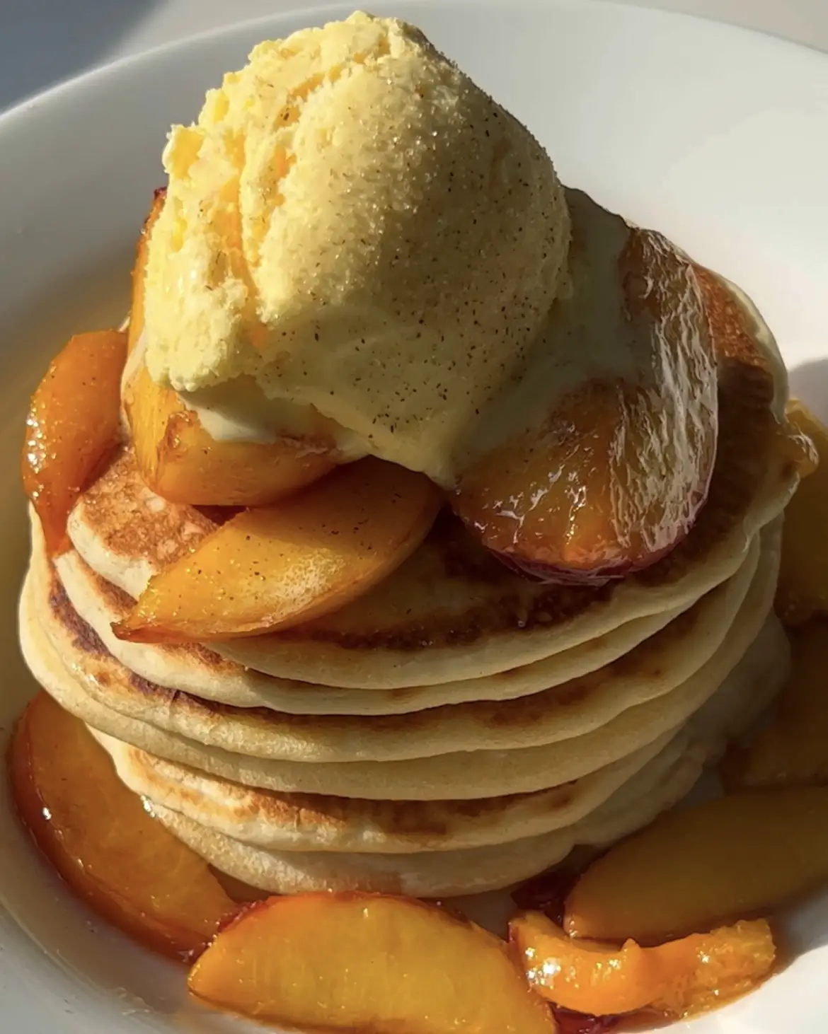 Stack the peaches and ice cream pancakes