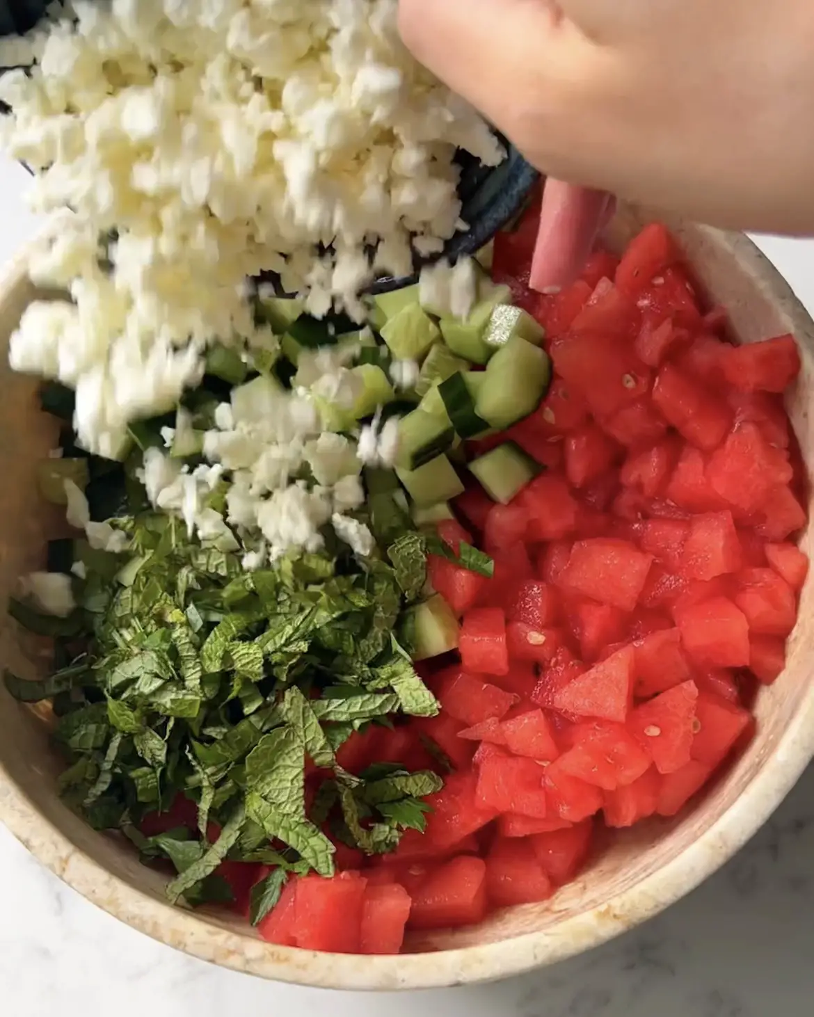 add all watermelon feta salad ingredients to a bowl